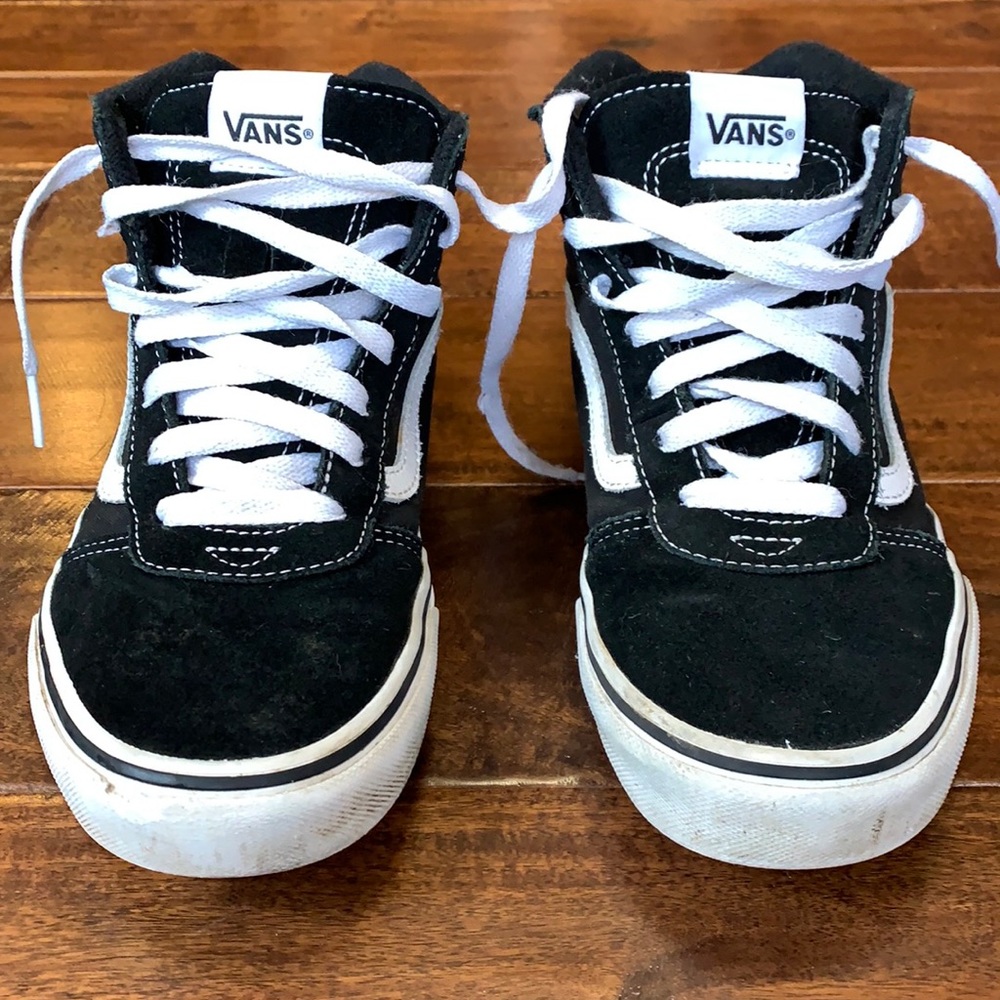 Black Vans high top shoe. Kids 5.5Y